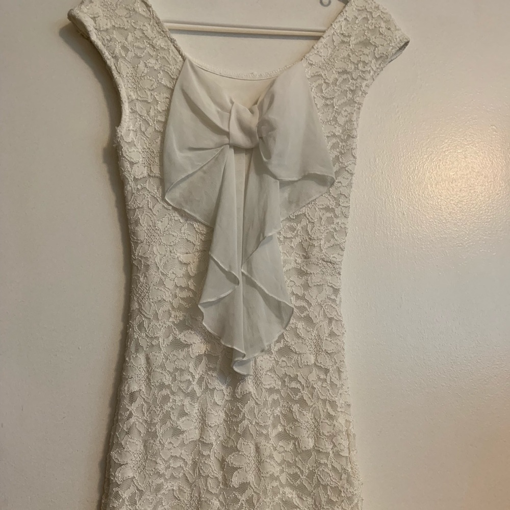 White skin tight dress